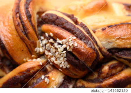 Close-up of sweet bread red bean texture background, homemade asian bakery Close-up of sweet bread red bean texture background, homemade asian bakery 143362129