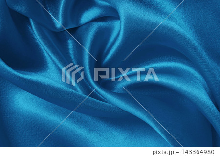 Blue fabric cloth texture for background and design art work, beautiful crumpled pattern of silk or linen. 143364980