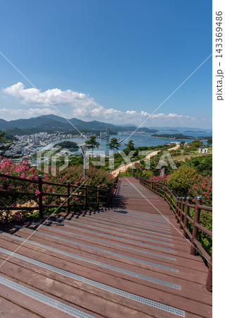 Wooden Stairway Overlooking Wando Harbor and Coastal City in South Korea Wooden Stairway Overlooking Wando Harbor and Coastal City in South Korea 143369486