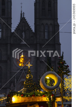 Church of Saint Ludmila with Prague Christmas market lights Church of Saint Ludmila with Prague Christmas market lights 143369993