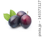 Sweet plums with leaves on white backgrounds 143373127