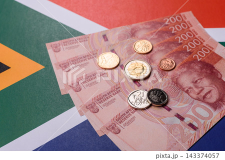 South Africa paper money, rand banknotes and cent coins as currency for exchange or travel South Africa paper money, rand banknotes and cent coins as currency for exchange or travel 143374057