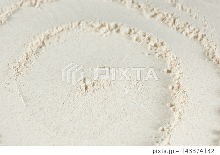 Organic wheat flour surface pattern close up top view Organic wheat flour surface pattern close up top view 143374132