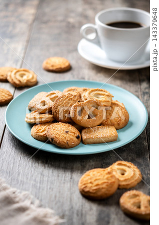 Assorted butter cookies on plate with cup of coffee Assorted butter cookies on plate with cup of coffee 143379648