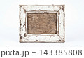 Small empty square frame with distressed white paint and aged wooden texture distressed weathered photography interior ornamental minimalist backdrop presentation frameable background isolated 143385808