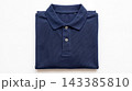 Folded dark navy blue polo shirt with textured fabric clothing textured template isolated background menswear minimalist business 143385810
