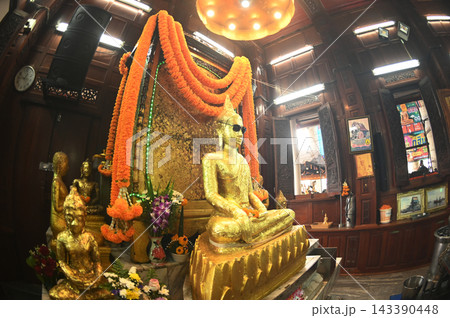 The Buddha image in the *ubosot* (ordination hall) at Wat Krok Krak known as "Luang Pho Pu" wears dark sunglasses, making it unlike any other Buddha image in Thailand. 143390448