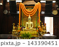 The Buddha image in the *ubosot* (ordination hall) at Wat Krok Krak known as "Luang Pho Pu" wears dark sunglasses, making it unlike any other Buddha image in Thailand. 143390451