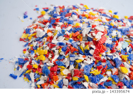 Plastic colorful pieces recycling shredded for industrial use. Plastic colorful pieces recycling shredded for industrial use. 143395674