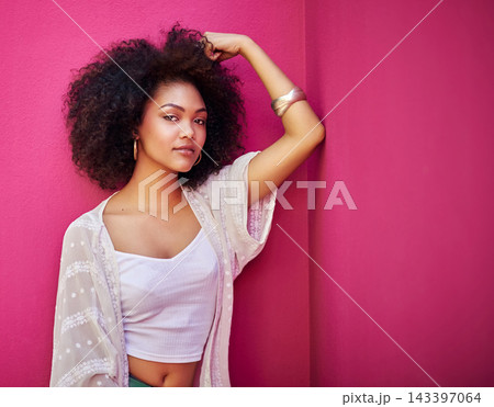 Edgy, girl and portrait in studio with fashion, stylish clothes and confident attitude by mockup. Female model, trendy and cool from Brazil with earrings, jewellery and pose by pink background 143397064