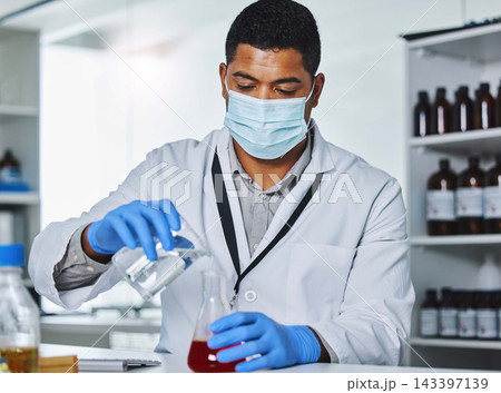 Mask, scientist or man with fluid in laboratory for medical research, experiment and or cure analysis. Healthcare, ppe or gloves of doctor with protection for chemical, liquid or mixture in test tube 143397139