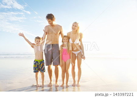 Blue sky, family and happy children at beach in swimsuit for holiday trip, summer vacation or weekend getaway. Light, fun parents and young kids for travel, adventure or bonding together at sea Blue sky, family and happy children at beach in swimsuit for holiday trip, summer vacation or weekend getaway. Light, fun parents and young kids for travel, adventure or bonding together at sea 143397221