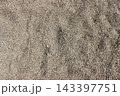 Fine brown gravel stone texture background background of tiny pebbles 143397751