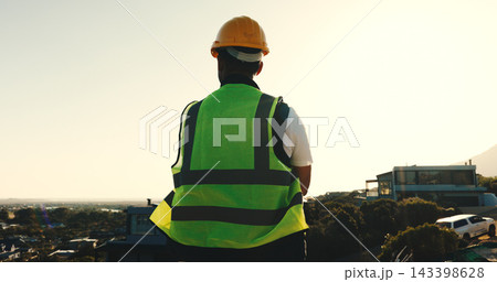 Builder, man and thinking at construction site with city view, brainstorming or planning for project. Back, worker and person outdoor in urban space with building evaluation, infrastructure or vision 143398628