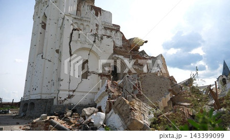 View to destroyed church at Kharkivska oblast. Ruined building after bomb attacks on ukrainian territory from russia army. Consequences of russian invasion of Ukraine. Slow motion 143399099