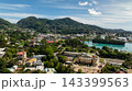 Harbor view with boats and cityscape nestled against green hills. Victoria. Seychelles, Mahe. 143399563