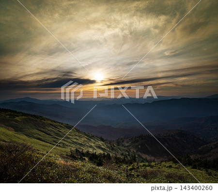 colorful sunrise in mountains 143400260