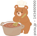 Cute cartoon bear wearing a chef hat and stirring a pot of warm homemade soup with a wooden spoon. 143400900