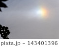 Rainbow flare light phenomenon in the daytime sky 143401396