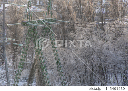 High Voltage Power Line Transmission Tower in Winter 143401480