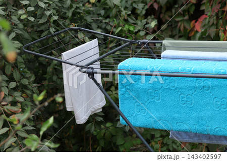 white shirt hanging on the shopping cart white shirt hanging on the shopping cart 143402597