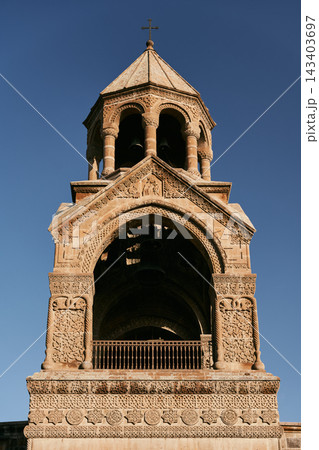 Bell tower of Etchmiadzin Cathedral surrounded by trees, Vagharshapat, Armenia 143403697