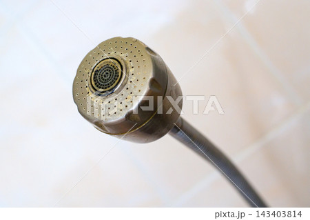 Dirty Old Kitchen Faucet Aerator Spray Nozzle with Limescale and Mineral Deposits 143403814