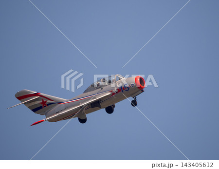 31 August 2019 Russia Zhukovsky MAKS MiG-15UTI Soviet jet fighter performing a demonstration flight at the international aviation and space show 31 August 2019 Russia Zhukovsky MAKS MiG-15UTI Soviet jet fighter performing a demonstration flight at the international aviation and space show 143405612