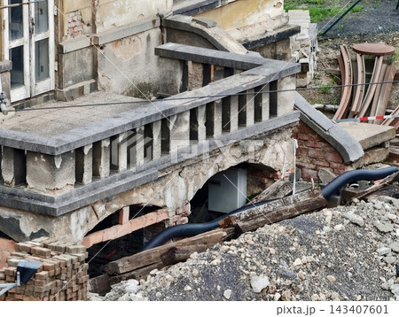 Decayed architectural remnants. Ancient stonework and damaged features suggest longterm neglect and decay Decayed architectural remnants. Ancient stonework and damaged features suggest longterm neglect and decay 143407601