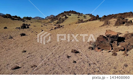 A desolate and unique landscape featuring striking rock formations that define the area A desolate and unique landscape featuring striking rock formations that define the area 143408060