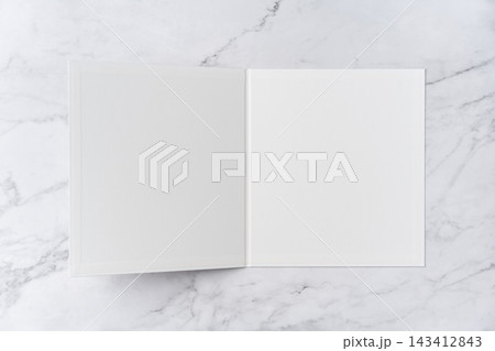Top view sequence from open to close blank white greeting card mockup on marble background with copy space : opening a blank white folded greeting card 143412843