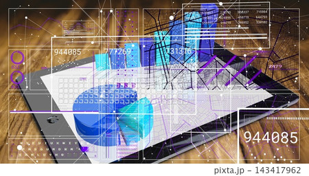 Displaying tablet computer showing map overlays, blue pie chart and virtual keyboard on wood desk 143417962