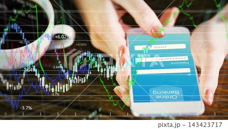 Tapping red nails holding phone at wooden table, viewing banking login and market charts, coffee 143423717