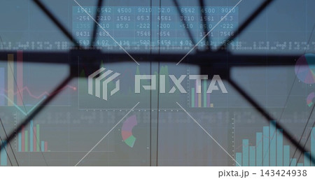 Projecting financial charts across glass panes with X-shaped brace at atrium, with numeric grid Projecting financial charts across glass panes with X-shaped brace at atrium, with numeric grid 143424938