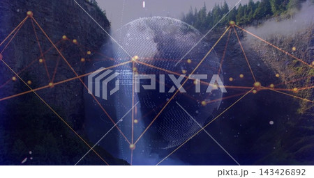 Blending waterfall and dotted globe, forming misty forested canyon with orange-gold network Blending waterfall and dotted globe, forming misty forested canyon with orange-gold network 143426892