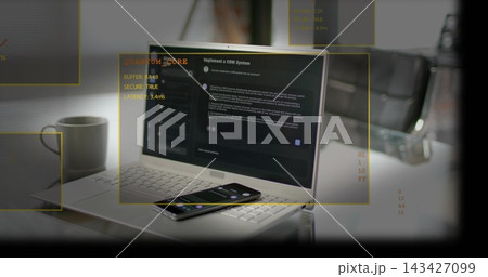Displaying silver laptop running dark CRM app on white table, smartphone and yellow AR overlays Displaying silver laptop running dark CRM app on white table, smartphone and yellow AR overlays 143427099