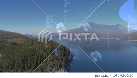 Showing forested peninsula projecting into calm lake, with rocky shore, pines, digital overlays 143430516