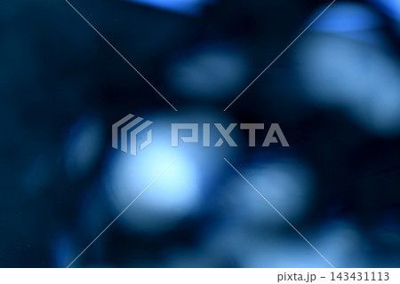 Abstract spots of light on a blue background. 143431113