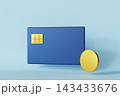 A blue credit card is placed against a light blue backdrop alongside a shiny gold coin. There is ample space around the objects for text or design 143433676