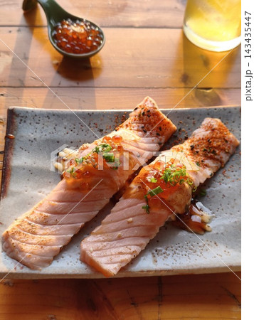 Closeup of delicious cooked salmon fish fillets Closeup of delicious cooked salmon fish fillets 143435447