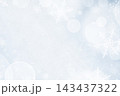A Christmas background with bokeh and small snowflakes 143437322