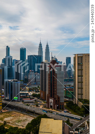 Cityscape view of Kuala Lumpur with Petronas Towers and modern architecture Cityscape view of Kuala Lumpur with Petronas Towers and modern architecture 143440339