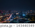 Vibrant Kuala Lumpur skyline at night with city lights and busy streets 143440349