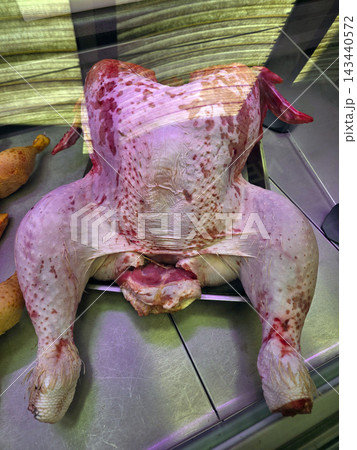 Thanksgiving day Raw Whole Plucked Turkey on Display at Butcher Counter 143440572