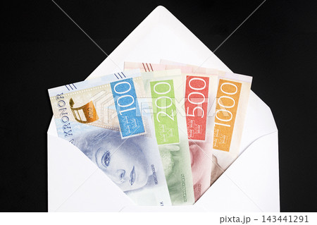 Swedish money - krone in a white envelope Swedish money - krone in a white envelope 143441291