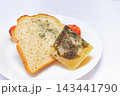 Moldy bread and jelly served on a plate in a kitchen setting during daylight hours 143441790