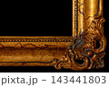Golden Frame With Ornate Design Set Against a Black Background Focusing on Texture and Details 143441803