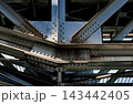 Riveted steel girder joint of industrial railway bridge. 143442405