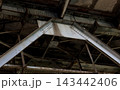 Low key view of heavy metal bridge support framework. 143442406