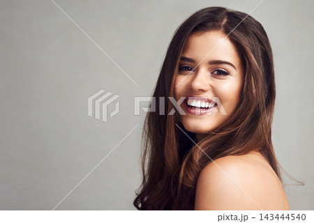 Hair, mockup and smile with portrait of woman in studio on gray background for keratin or shampoo treatment. Aesthetic, cosmetics and space with happy model at salon for conditioning or haircare Hair, mockup and smile with portrait of woman in studio on gray background for keratin or shampoo treatment. Aesthetic, cosmetics and space with happy model at salon for conditioning or haircare 143444540
